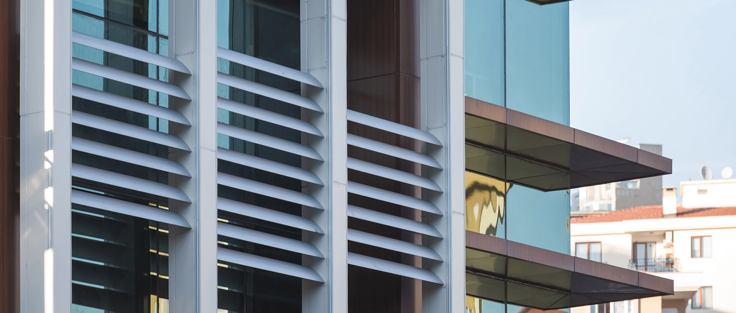 building facade with aluminium horizontal sunbreakers